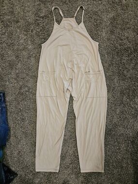 Sleeveless Beige Relaxed Jumpsuit with Pockets
